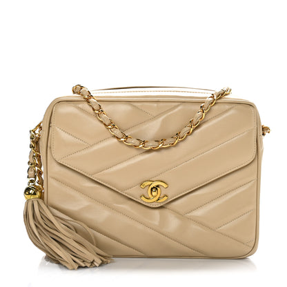 Chanel Lambskin Chevron Quilted Tassel Flap Camera Case Beige 1 of 11