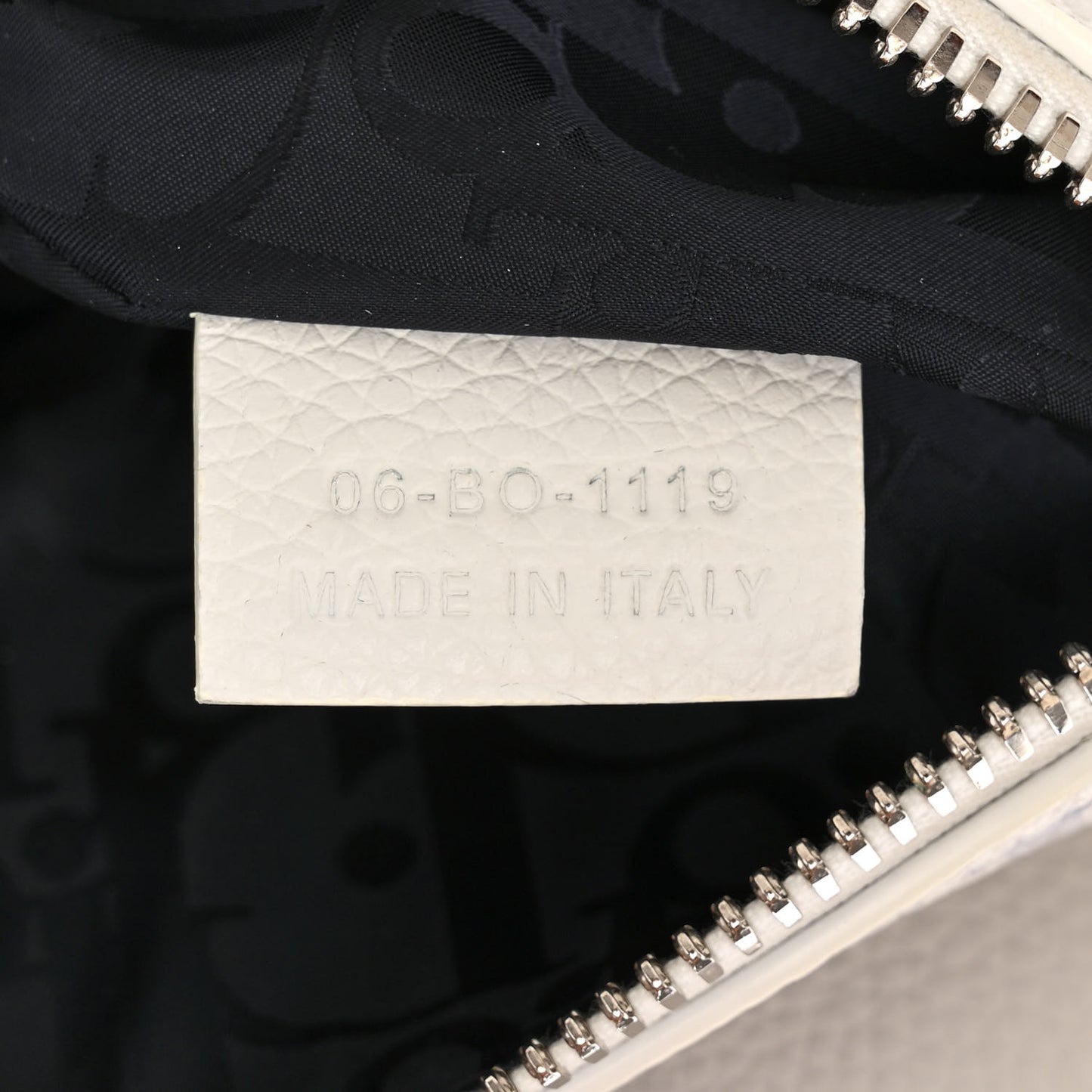 X Daniel Arsham Grained Calfskin Newspaper Print Saddle Bag White