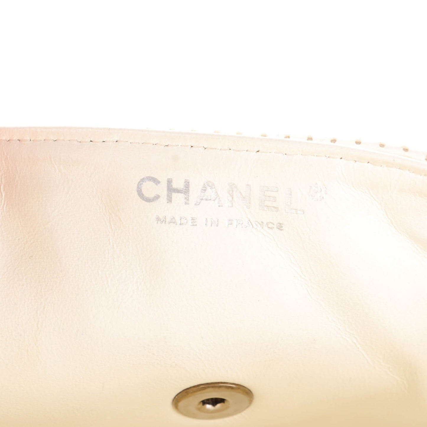 Lambskin Perforated East West Flap White