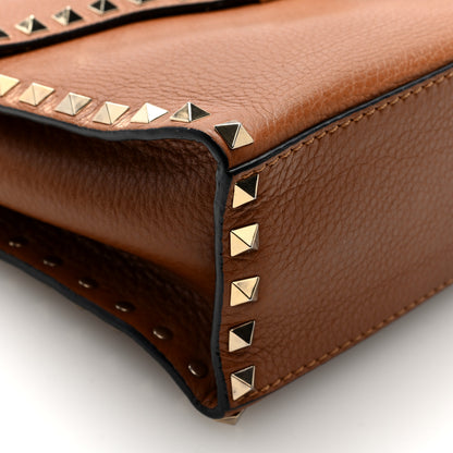 Valentino Garavani Pebbled Calfskin Rockstud Flip Lock Top Handle Bag Cognac 9 of 9
