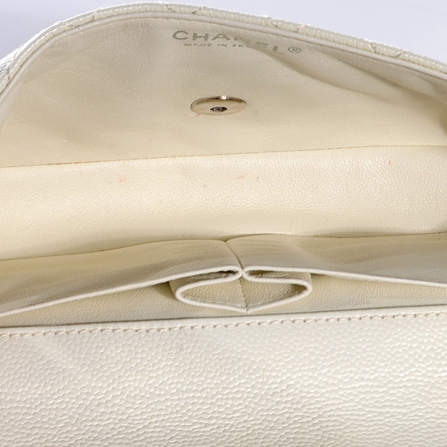 Caviar East West Flap White