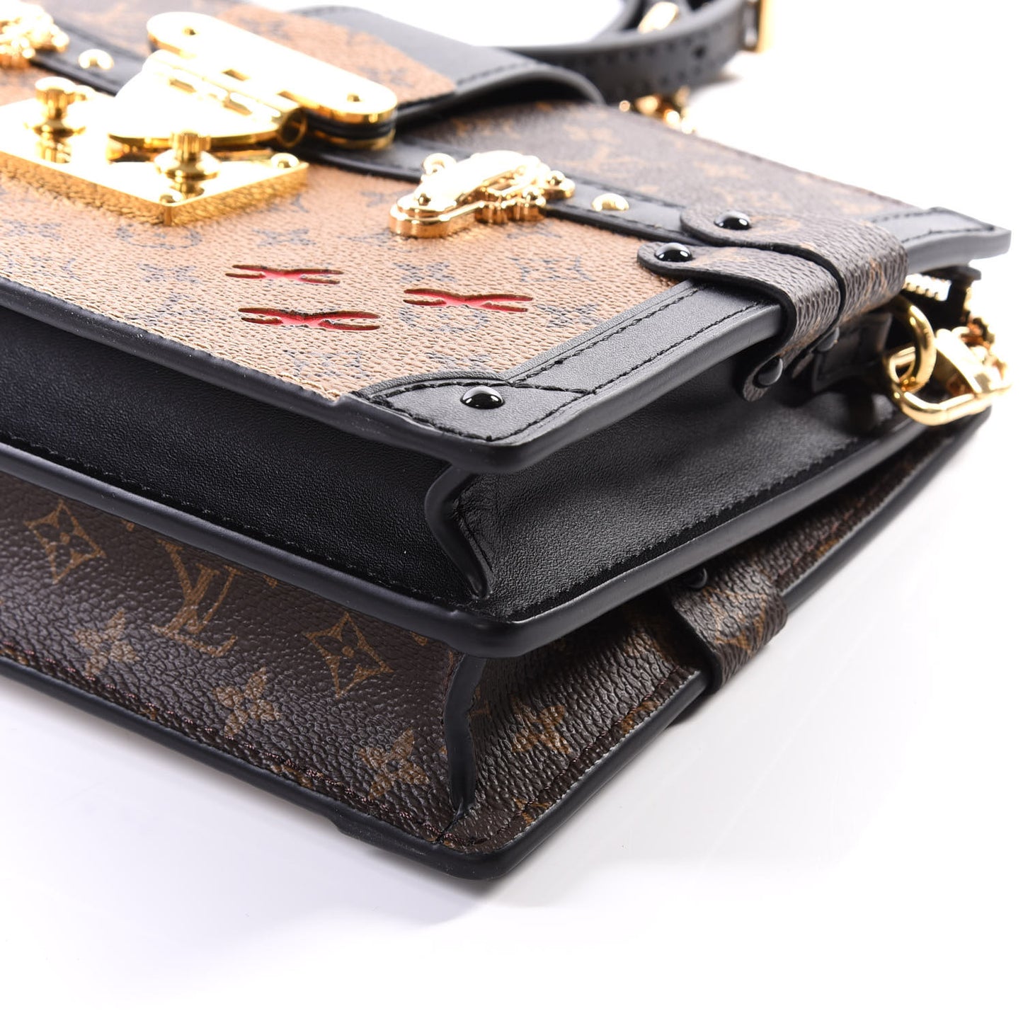 Reverse Monogram Trunk Clutch
