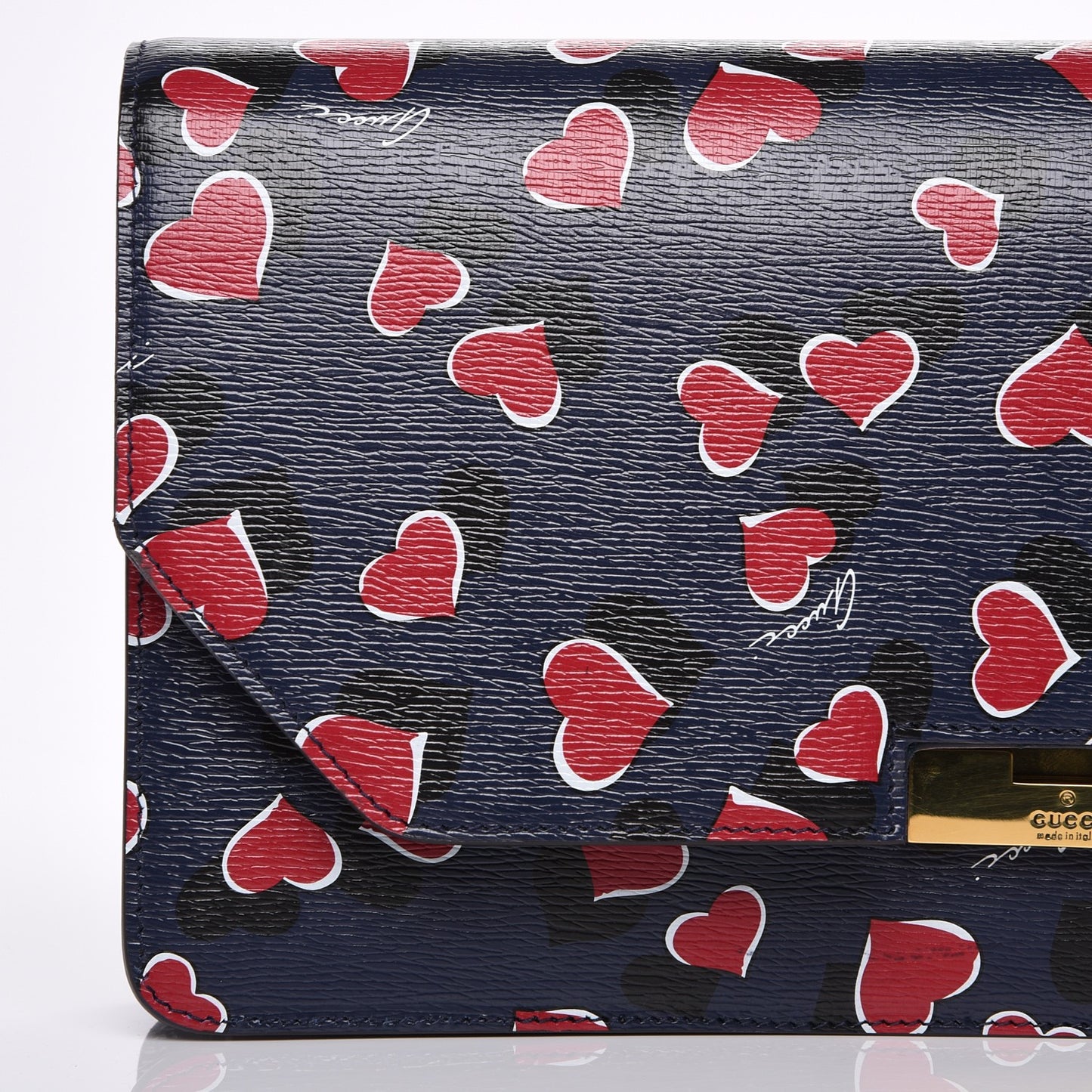 Textured Calfskin Heartbeat Print Clutch Blue
