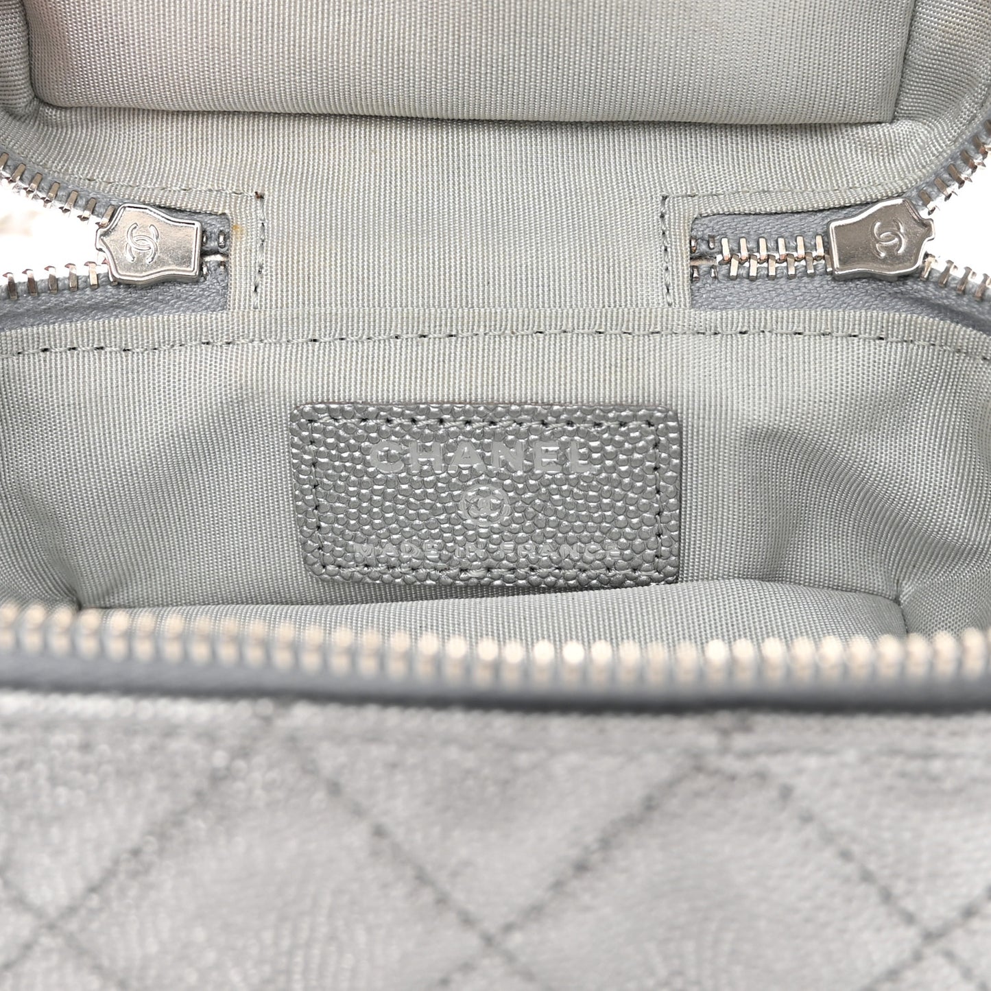 Metallic Caviar Quilted Mini Top Handle Vanity With Chain Silver
