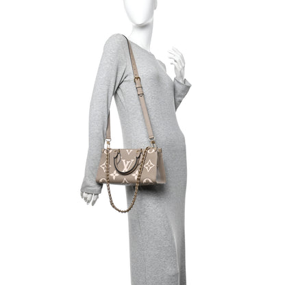 Louis Vuitton Empreinte OnTheGo East West Dove Cream 2 of 9