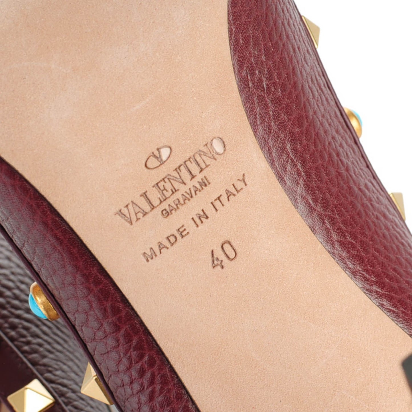 Pebbled Calfskin Rockstud Rolling 100mm Pumps 40 Rubin