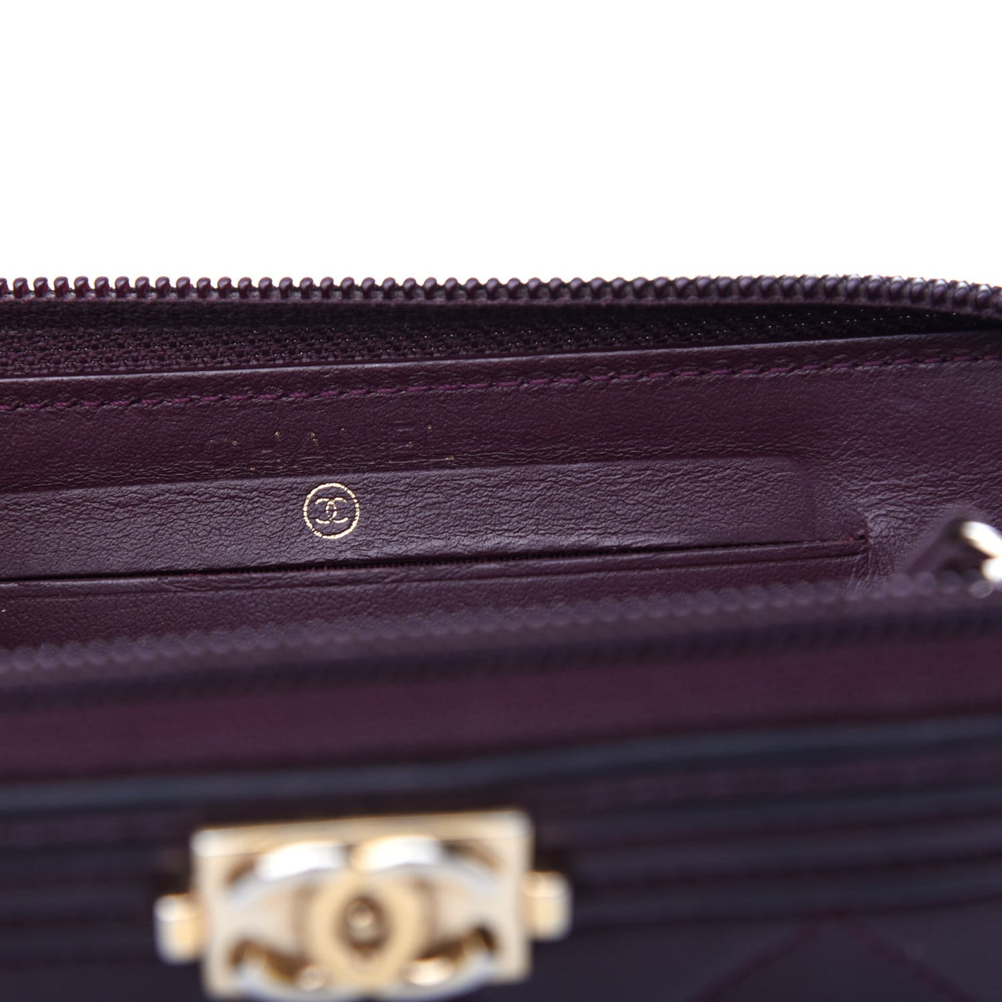 Caviar Quilted Small Boy Zip Around Wallet Dark Purple