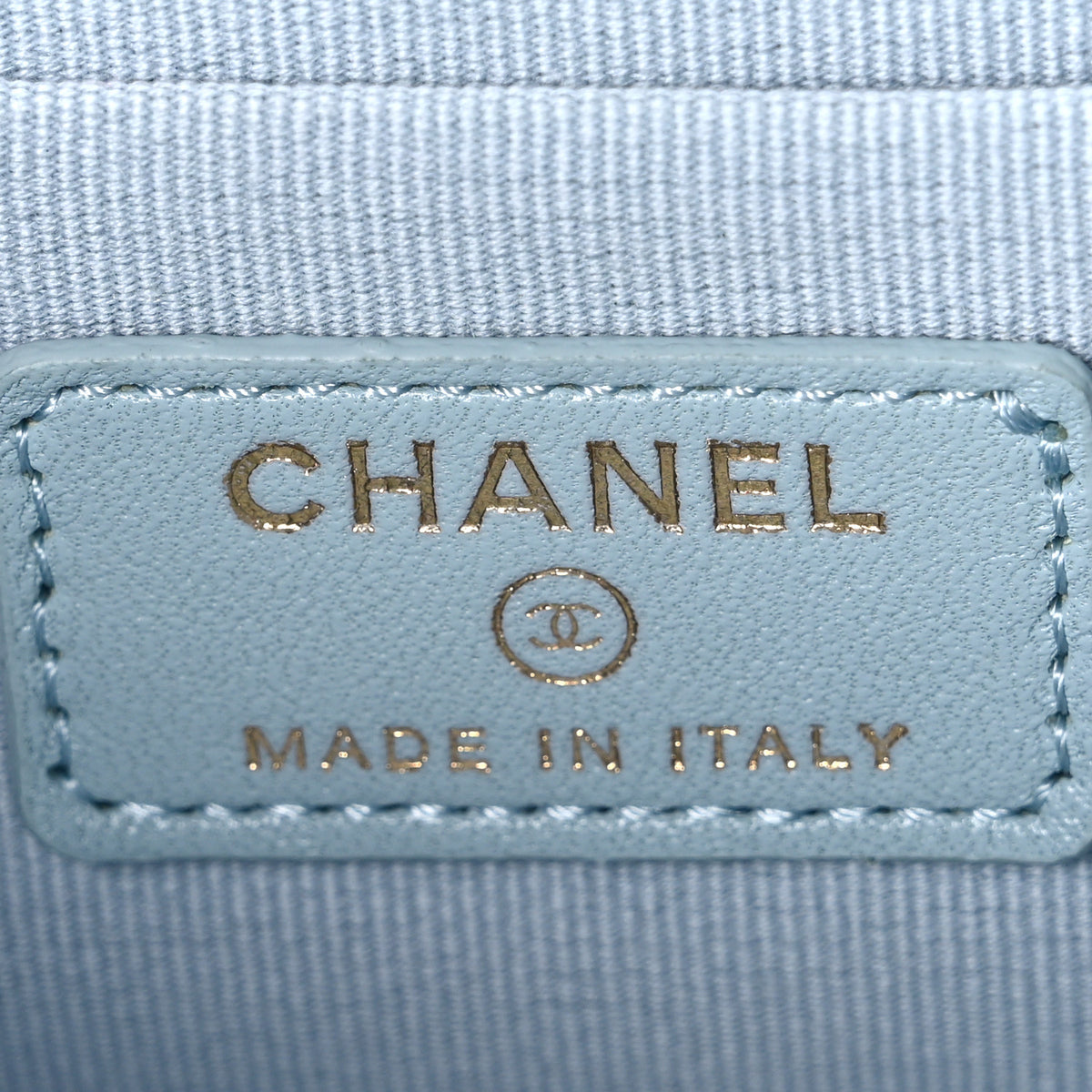 Lambskin Quilted Small Top Handle Vanity Case With Chain Light Blue