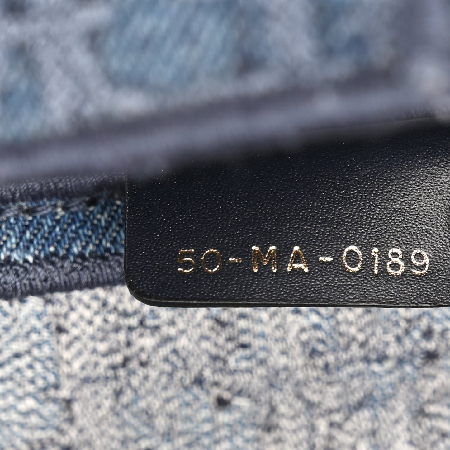 Oblique Embroidered Saddle Bag Denim Blue