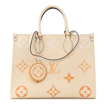 Louis Vuitton Empreinte Monogram Giant By The Pool Onthego MM Cream Saffron 1 of 11