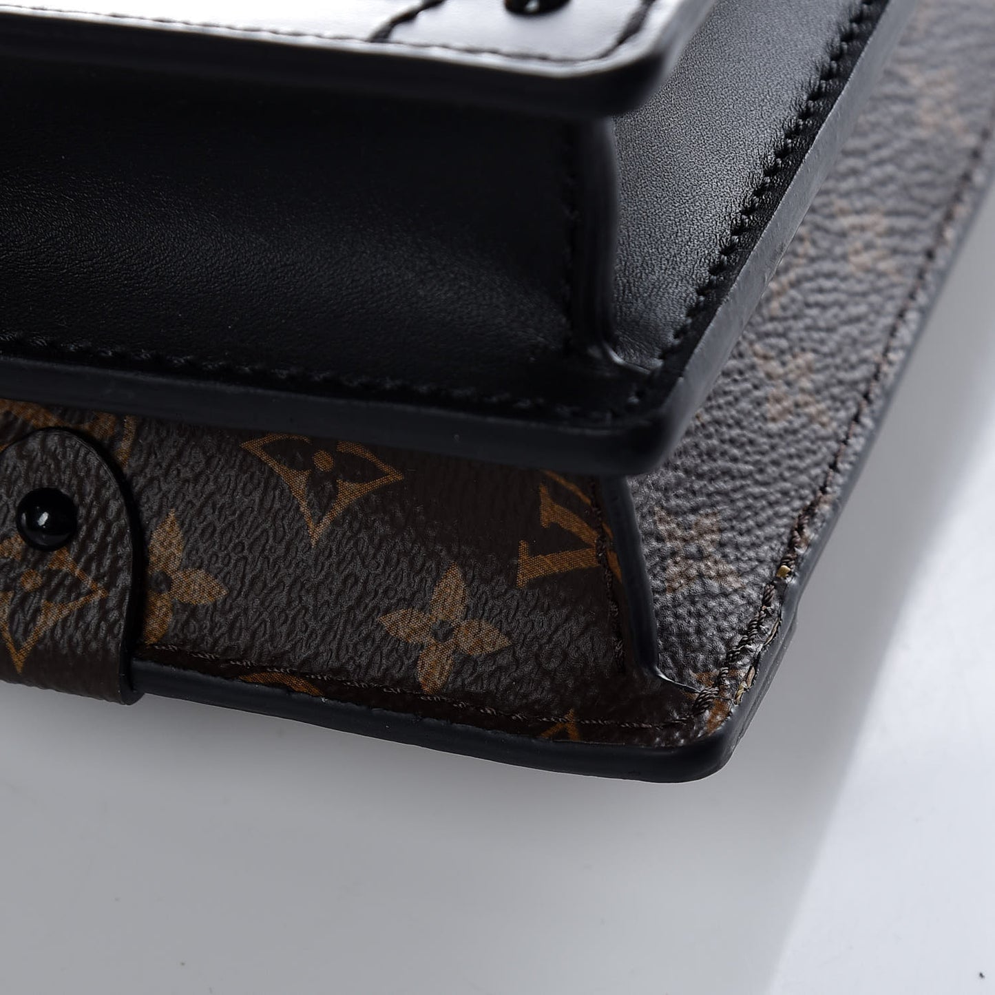 Reverse Monogram Trunk Clutch