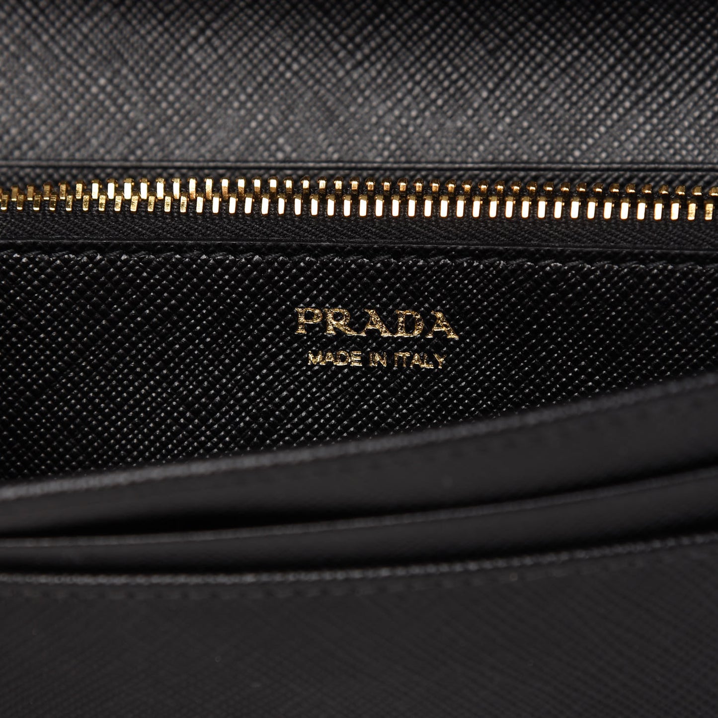 Saffiano Triangle Logo Continental Flap Travel Wallet Black