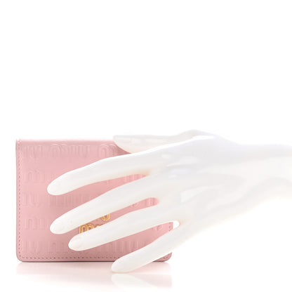 Miu Miu Calfskin Logo Embossed Bi-Fold Compact Wallet Alabastro 2 of 9