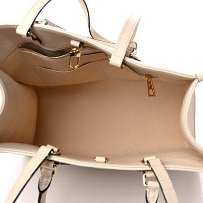 Louis Vuitton Empreinte Monogram Giant Onthego MM Creme 5 of 8