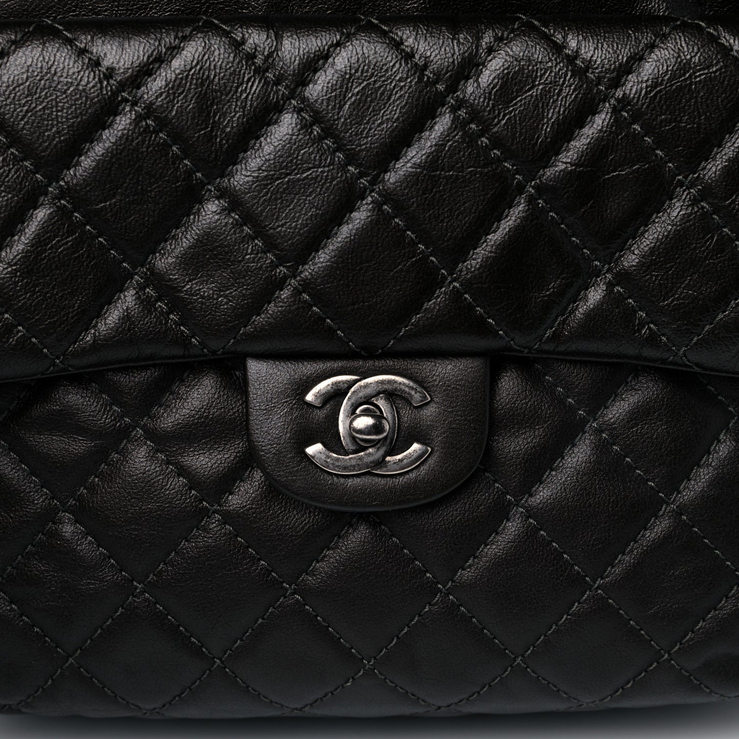 Metallic Lambskin Quilted Drawstring Backpack Dark Grey