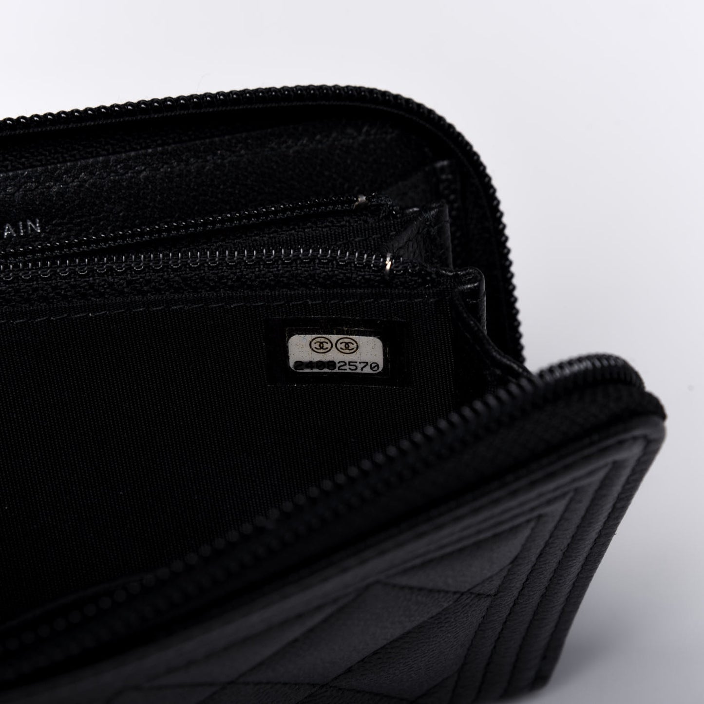 Caviar Quilted Small Boy Zip Around Wallet So Black