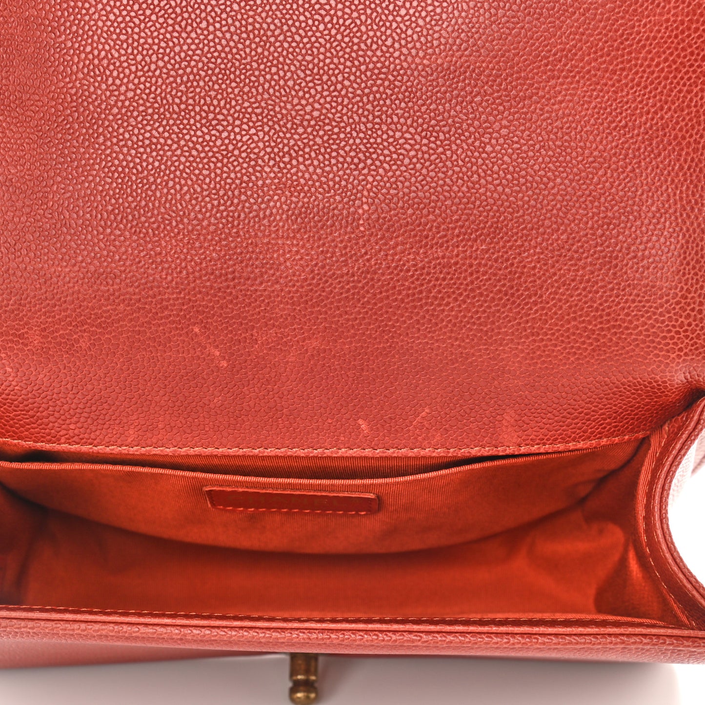 Caviar Quilted Medium Boy Flap Dark Orange