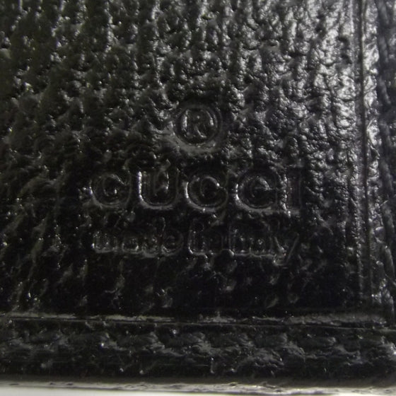 Monogram Engraved Metal Plate Continental Wallet Black