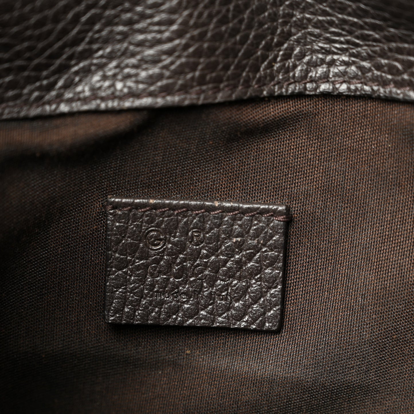 Monogram Dollar Calfskin O Drawstring Backpack Beige Ebony Testa di Moro Dark Chocolate