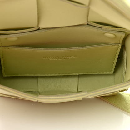 Bottega Veneta Lambskin Maxi Intrecciato Extra Mini Cassette Crossbody Bag Lemon Washed 5 of 9