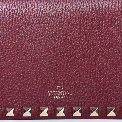 Valentino Garavani Pebbled Calfskin Rockstud Wallet on Chain Cerise 9 of 9