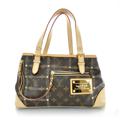 Louis Vuitton Monogram Riveting 1 of 9