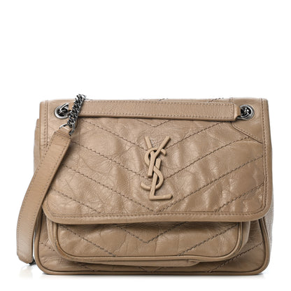 Saint Laurent Crinkled Calfskin Matelasse Monogram Baby Niki Chain Satchel Light Taupe 1 of 5