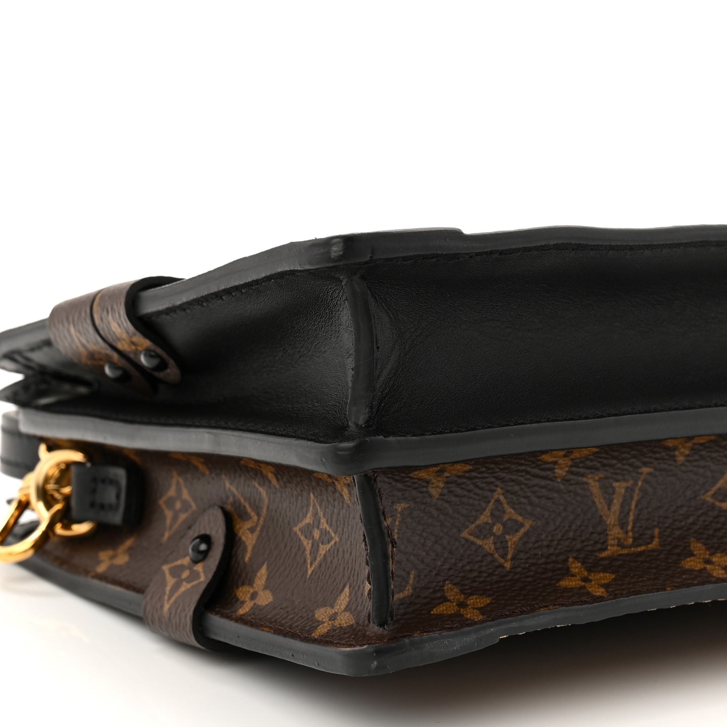 Reverse Monogram Trunk Clutch