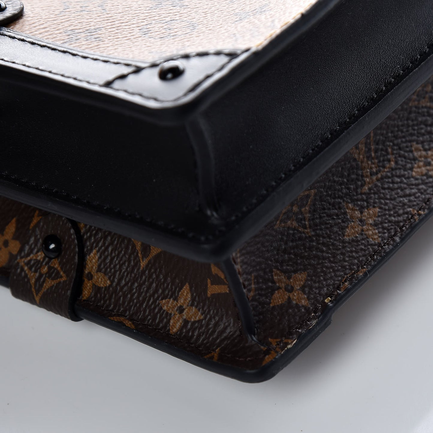 Reverse Monogram Trunk Clutch