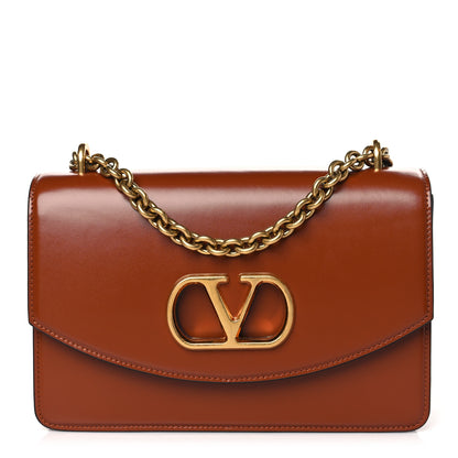 Valentino Garavani Vitello Vlogo Cutout Chain Shoulder Bag Saddle Brown 1 of 9