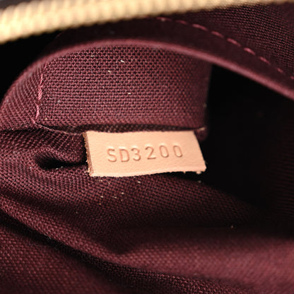 Louis Vuitton Monogram Rivoli MM 7 of 10