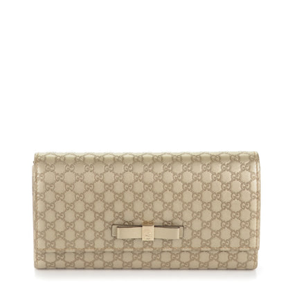Gucci Metallic Microguccissima Bow Continental Wallet Golden Beige 1 of 7