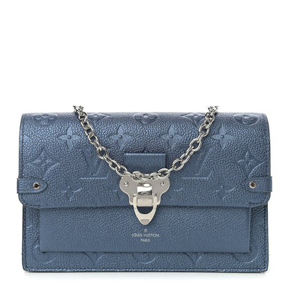 Louis Vuitton Metalli Empreinte Monogram Vavin Chain Wallet Navy Nacre 1 of 10