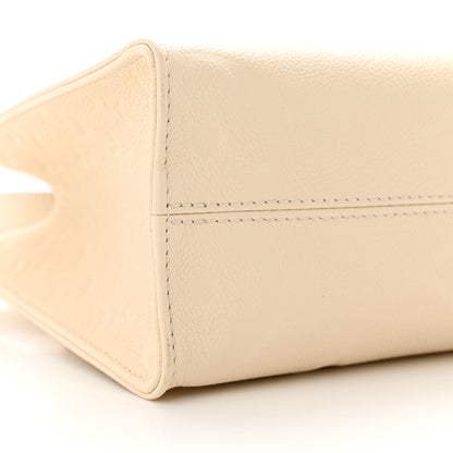 Louis Vuitton Empreinte Monogram Giant Onthego PM Cream Beige 8 of 9
