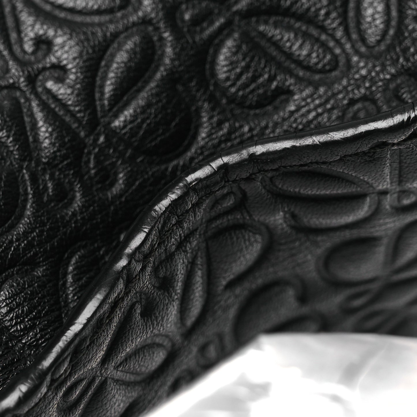 Calfskin Embossed Repeat T Pouch Black