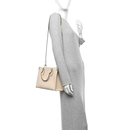 Louis Vuitton Empreinte Monogram Giant Onthego PM Cream Beige 2 of 9