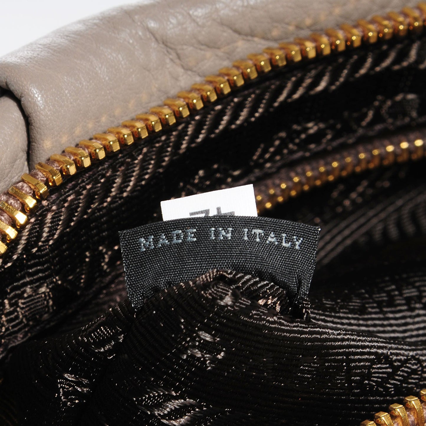 Vitello Daino Wristlet Clutch Argilla