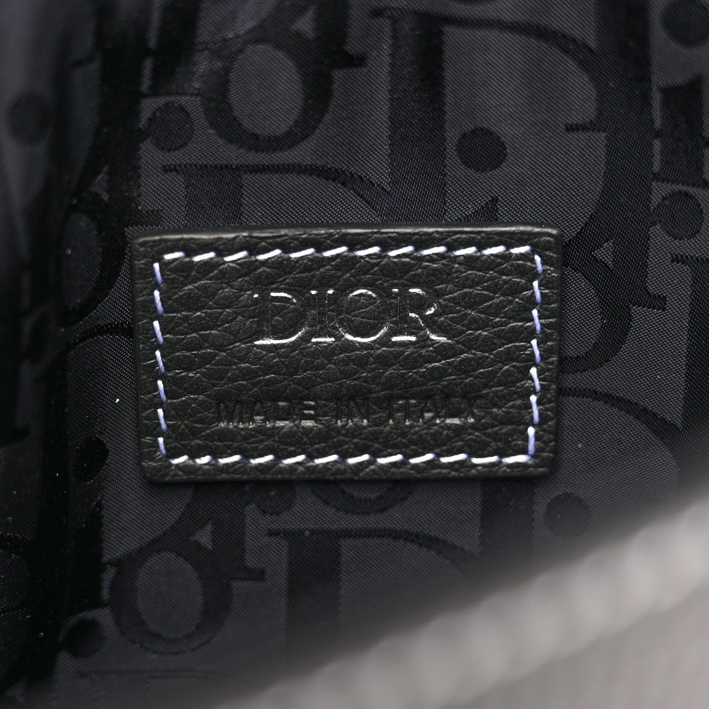 X KAWS Grained Calfskin Saddle Pouch Black