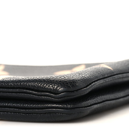 Louis Vuitton Empreinte Monogram Giant Double Zip Pochette Black Cream 10 of 12