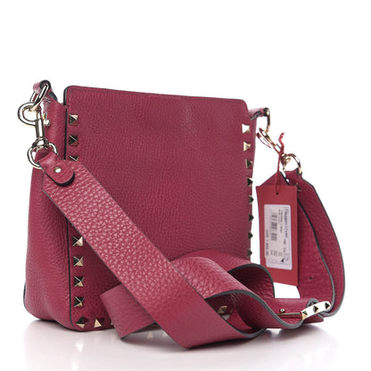 Valentino Garavani Pebbled Calfskin Mini Rockstud Flip-Lock Messenger Bag Raspberry 2 of 8