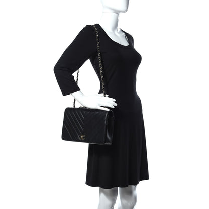 Chanel Calfskin Chevron Quilted Medium Statement Flap Black 2 of 17