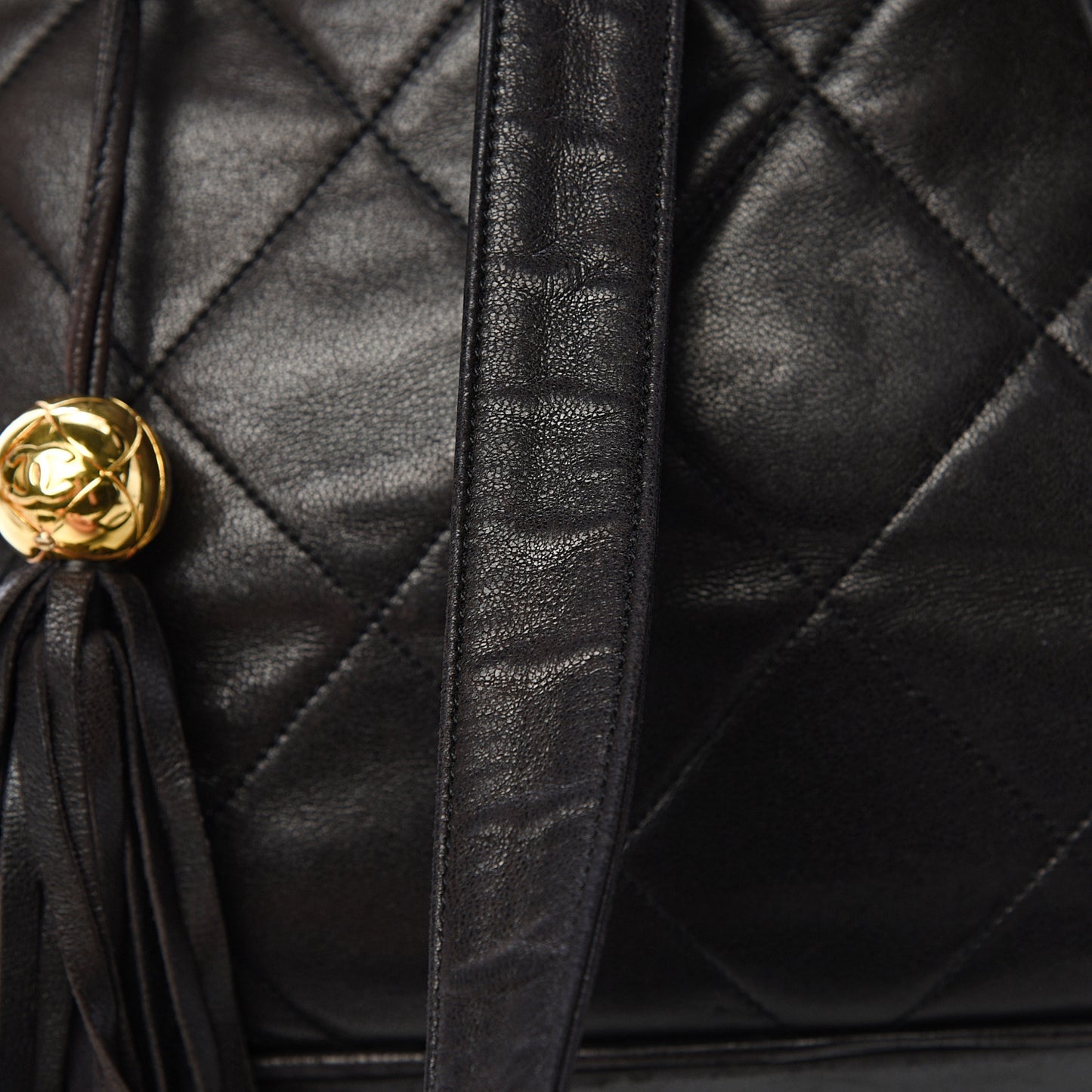 Lambskin Quilted Tassel Drawstring Backpack Dark Bown