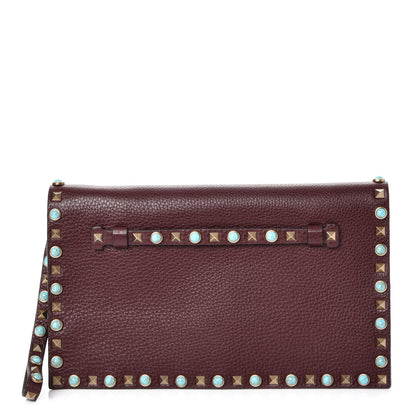 Valentino Garavani Pebbled Calfskin Rockstud Rolling Wristlet Clutch Rubin 1 of 7