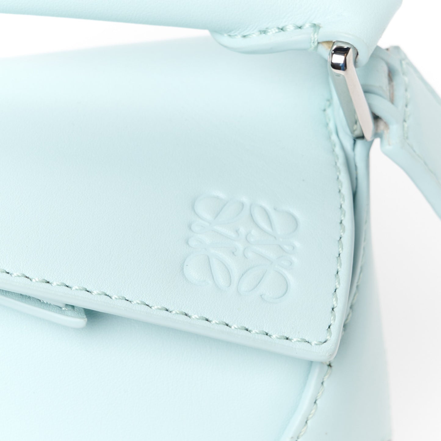 X SUNA FUJITA Shiny Calfskin Mini Penguin Puzzle Edge Bag Blue Iceberg