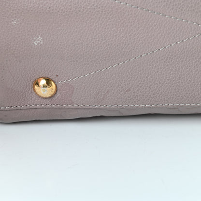 Louis Vuitton Empreinte Montaigne MM Mastic 16 of 19