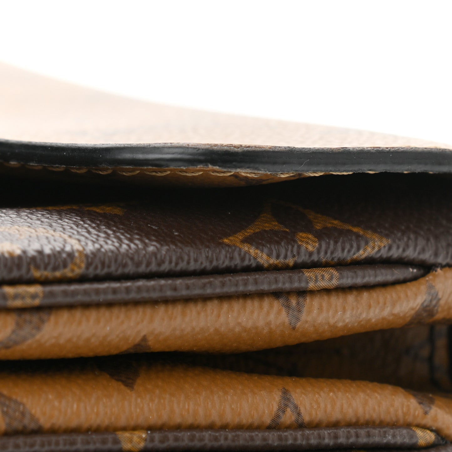 Reverse Monogram Pochette Metis