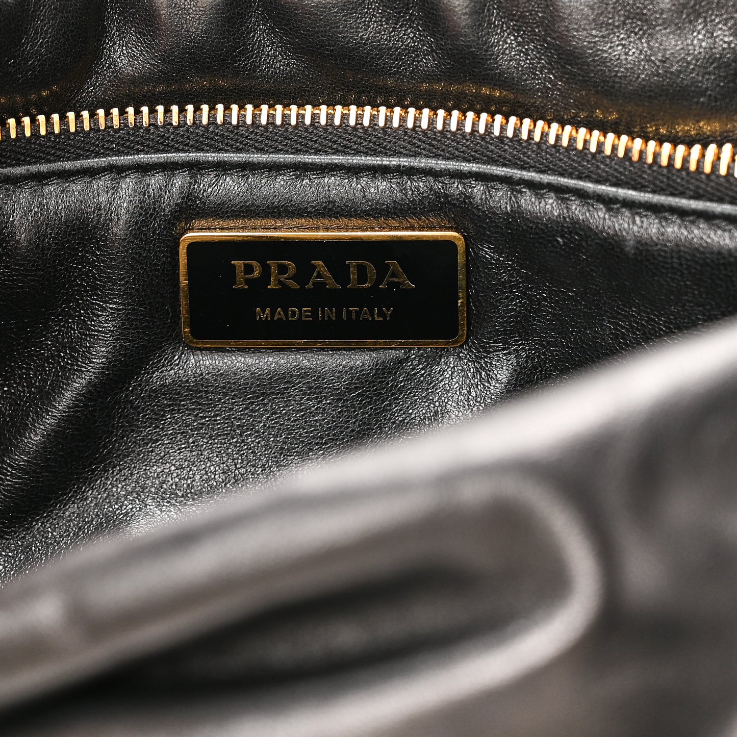 Nappa Soft Padded Logo Embossed Triangle Quilted Small Shoulder Bag Black
