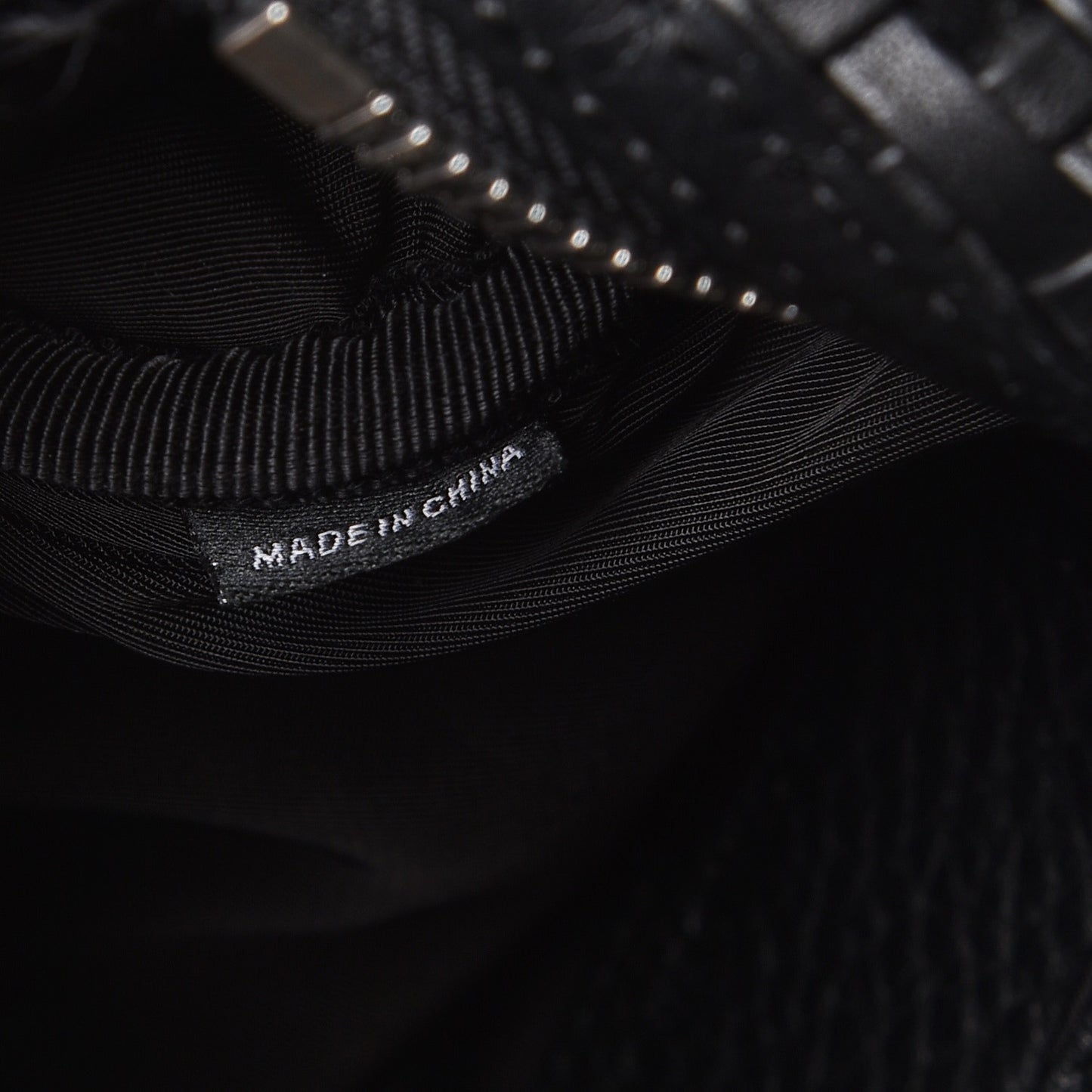 Pebbled Lambskin Woven Rocco Black Silver Hardware