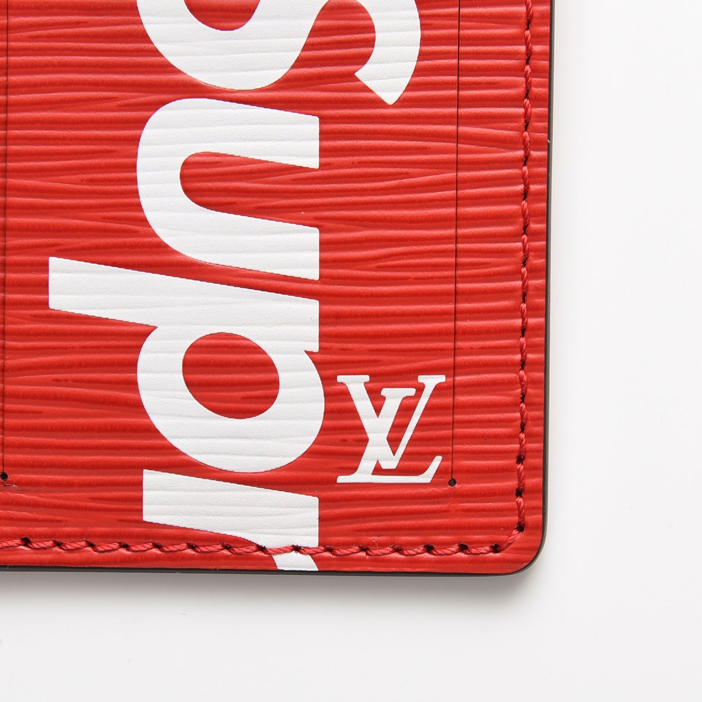 X SUPREME Epi Luggage Tag Red