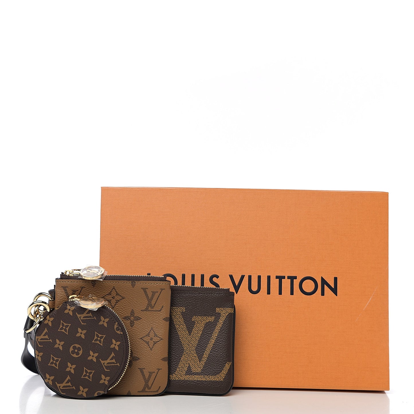 Reverse Monogram Giant Trio Pouch